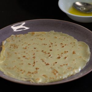 Crêpe on a purple plate